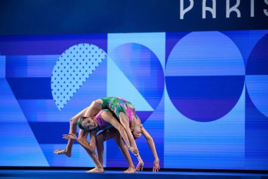 PARIS, FRANCE - 9 AUGUST, 2024: WANG Liuyi, WANG Qianyi, The Artistic Swimming, Duet, Technical Routine, Artistic Swimming, Duet, Technical Routine, the Paris 2024 Olympic Games at Aquatics Centre clipart