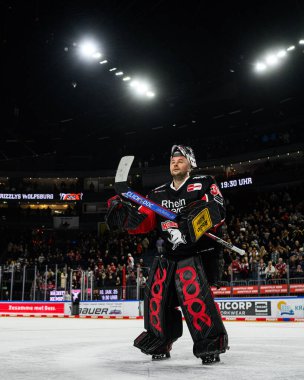 COLOGNE, GERMANY - 7 JANUARY, 2025 Ice hockey match of DEL Koelner Haie - Eisbaeren Berlin at LANXESS ARENA. For editorial use only. Resale or distribution is prohibited. clipart