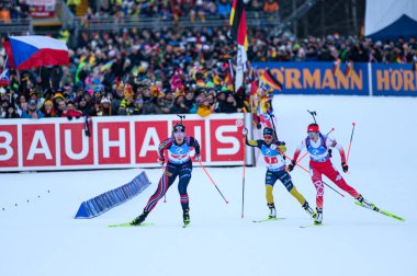 RUHPOLDING, GERMANY - 18 JANUARY, 2025: + - Relay Women, BMW IBU World Cup 2025. For editorial use only. Resale or distribution is prohibited. clipart