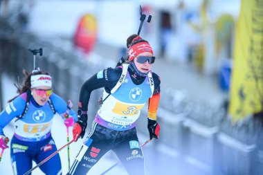 RUHPOLDING, GERMANY - 18 JANUARY, 2025: Sophia Schneider - Relay Women, BMW IBU World Cup 2025. For editorial use only. Resale or distribution is prohibited. clipart