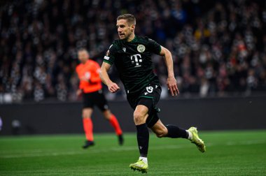 FRANKFURT, GERMANY - 23 JANUARY, 2025: Barnabas Varga - The UEFA Europa League football match between SG Eintracht Frankfurt and Ferencvarosi TC at Frankfurt Stadion. clipart