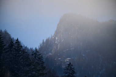 Day Light. Beautiful winter landscape on the mountains in Ruhpolding in Bavaria, Germany clipart