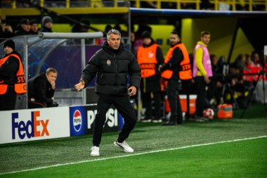 DORTMUND, GERMANY - 29 JANUARY, 2025: Head Coach, Marino Pusic - The match UEFA Champions League Borussia Dortmund vs. Shakhtar Donetsk at Signal Iduna Park. For editorial use only. Resale or distribution is prohibited. clipart