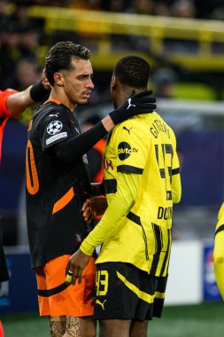 DORTMUND, GERMANY - 29 JANUARY, 2025: Marlon Gomes, Jamie Gittens - The match UEFA Champions League Borussia Dortmund vs. Shakhtar Donetsk at Signal Iduna Park. For editorial use only. Resale or distribution is prohibited. clipart