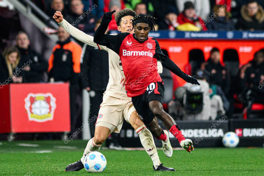 LEVERKUSEN, GERMANY - 15 FEBRUARY, 2025: Hiroki Ito, Jeremie Frimpong, The Bundesliga match FC Bayer 04 Leverkusen vs FC Bayern Muenchen at BayArena