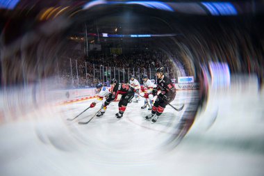 COLOGNE, GERMANY - 16 FEBRUARY, 2025: Hockey match of Penny DEL Koelner Haie - Duesseldorfer EG at Lanxess Arena clipart