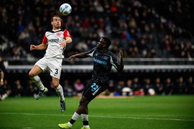 FRANKFURT, GERMANY - 1 Mart 2025: Arthur Theate - Bundesliga maçı Eintracht Frankfurt FC Bayer 04 Leverkusen 'e karşı Deutsche Bank Park' ta. 
