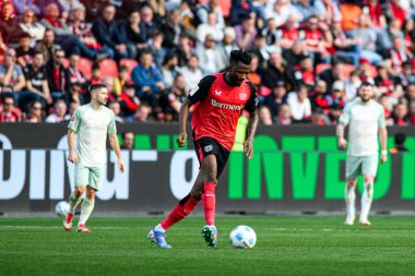 LEVERKUSEN, GERMANY - 8 MARCH, 2025: Edmond Tapsoba - Bundesliga, matchday 25. The match Bayer Leverkusen vs. SV Werder Bremen at BayArena clipart