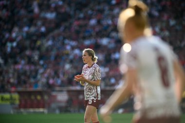 COLOGNE, GERMANY - 9 MARCH, 2025 The match of Women Bundesliga 1.FC Koeln Frauen vs FC Bayern Muenchen at Rhein Energie Stadion. clipart