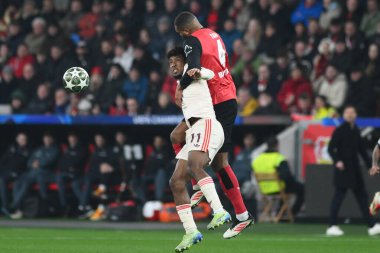 LEVERKUSEN, GERMANY - 11 Mart 2025: Jonathan Tah, Kingsley Coman - Bayer 04 Leverkusen ile Bayarena 'da FC Bayern Münih arasındaki UEFA Şampiyonlar Ligi maçı.