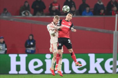 LEVERKUSEN, GERMANY - 11 Mart 2025: Alejandro Grimaldo - Bayer 04 Leverkusen ile Bayarena 'da FC Bayern Münih arasındaki UEFA Şampiyonlar Ligi maçı.