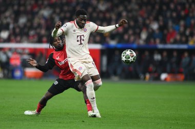 LEVERKUSEN, GERMANY - 11 Mart 2025: Alphonso Davies - Bayer 04 Leverkusen-FC Bayern Münih arasındaki UEFA Şampiyonlar Ligi maçı.