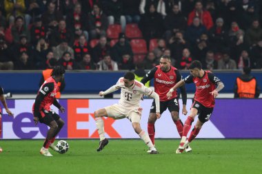 LEVERKUSEN, GERMANY - 11 Mart 2025: Jamal Musiala - Bayena 'da Bayer 04 Leverkusen ile FC Bayern Münih arasındaki UEFA Şampiyonlar Ligi futbol maçı.