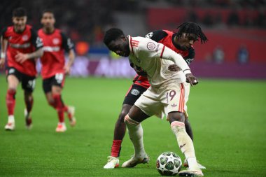 LEVERKUSEN, GERMANY - 11 Mart 2025: Alphonso Davies - Bayer 04 Leverkusen-FC Bayern Münih arasındaki UEFA Şampiyonlar Ligi maçı.