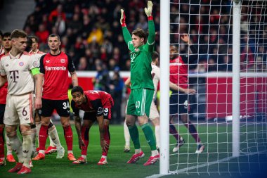 LEVERKUSEN, GERMANY - 11 Mart 2025: Jonas Urbig - Bayena 'da Bayer 04 Leverkusen ile FC Bayern Münih arasındaki UEFA Şampiyonlar Ligi futbol maçı.