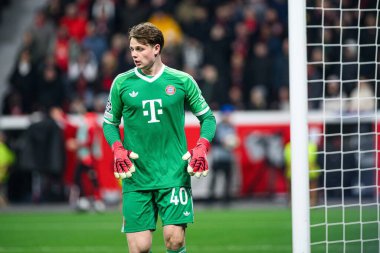 LEVERKUSEN, GERMANY - 11 Mart 2025: Jonas Urbig - Bayena 'da Bayer 04 Leverkusen ile FC Bayern Münih arasındaki UEFA Şampiyonlar Ligi futbol maçı.