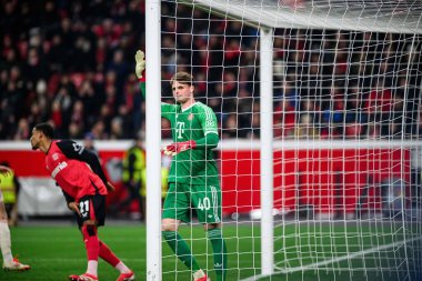 LEVERKUSEN, GERMANY - 11 Mart 2025: Jonas Urbig - Bayena 'da Bayer 04 Leverkusen ile FC Bayern Münih arasındaki UEFA Şampiyonlar Ligi futbol maçı.