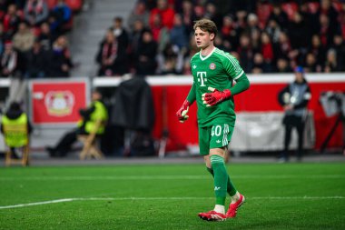 LEVERKUSEN, GERMANY - 11 Mart 2025: Jonas Urbig - Bayena 'da Bayer 04 Leverkusen ile FC Bayern Münih arasındaki UEFA Şampiyonlar Ligi futbol maçı.