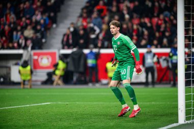 LEVERKUSEN, GERMANY - 11 Mart 2025: Jonas Urbig - Bayena 'da Bayer 04 Leverkusen ile FC Bayern Münih arasındaki UEFA Şampiyonlar Ligi futbol maçı.
