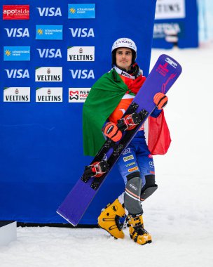 WINTERBERG, GERMANY - 15 MARCH, 2025:  BORMOLINI Maurizio, ITA - VISA FIS Snowboard Alpine World Cup Winterberg 2025 at Poppenberg. For editorial use only. clipart