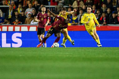 GENK, BELGIUM - 23 Mart 2025: Jeremy Doku - UEFA Uluslar Ligi Belçika Futbol Maçı - Cegeka Arena 'da Ukrayna.