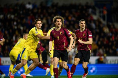 GENK, BELGIUM - 23 Mart 2025: Wout Faes - UEFA Uluslar Ligi Belçika Futbol Maçı - Cegeka Arena 'da Ukrayna.