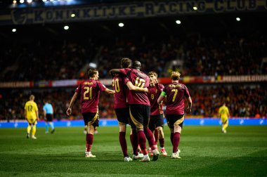 GENK, BELGIUM - 23 Mart 2025: Romelu Lukaku, Maxim De Cuyper, Timothy Castagne - UEFA Milletler Ligi Belçika - Cegeka Arena 'da Ukrayna.