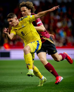 GENK, BELGIUM - 23 Mart 2025: Georgiy Sudakov - UEFA Uluslar Ligi Belçika Futbol Maçı - Cegeka Arena 'da Ukrayna.