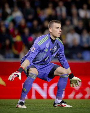 GENK, BELGIUM - 23 Mart 2025: Andriy Lunin - UEFA Uluslar Ligi Belçika Futbol Maçı - Cegeka Arena 'da Ukrayna.