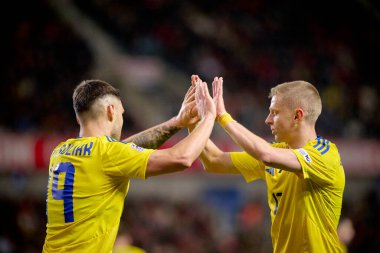 GENK, BELGIUM - 23 Mart 2025: Oleksandr Zinchenko, Oleksii Hutsuliak - UEFA Milletler Ligi Belçika - Cegeka Arena 'da Ukrayna.