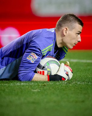 GENK, BELGIUM - 23 Mart 2025: Andriy Lunin - UEFA Uluslar Ligi Belçika Futbol Maçı - Cegeka Arena 'da Ukrayna.