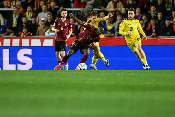 GENK, BELGIUM - 23 Mart 2025: Jeremy Doku - UEFA Uluslar Ligi Belçika Futbol Maçı - Cegeka Arena 'da Ukrayna.