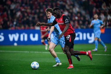 LEVERKUSEN, ALMANY - 28 Mart 2025: Tim Oermann, Victor Boniface - Bundesliga, maç 27. Bayer Leverkusen, Bayarena 'da Bochum' a karşı.