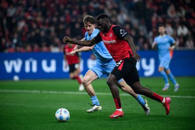 LEVERKUSEN, ALMANY - 28 Mart 2025: Tim Oermann, Victor Boniface - Bundesliga, maç 27. Bayer Leverkusen, Bayarena 'da Bochum' a karşı.