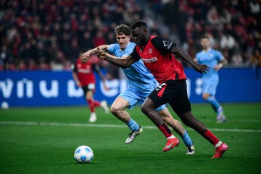 LEVERKUSEN, ALMANY - 28 Mart 2025: Tim Oermann, Victor Boniface - Bundesliga, maç 27. Bayer Leverkusen, Bayarena 'da Bochum' a karşı.