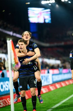 COLOGNE, GERMANY - 5 APRIL, 2025: Linus Gechter, Fabian Reese - Rhein Energie Stadion 'da 2.Bundesliga 1.FC Koeln' e karşı Hertha BSC maçı