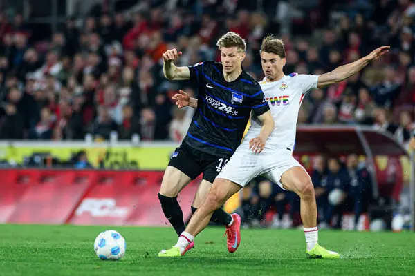 COLOGNE, GERMANY - 5 APRIL, 2025: Luca Schuler, Jooel Schmied - Rhein Energie Stadion 'da 2.Bundesliga 1.FC Koeln' e karşı Hertha BSC maçı