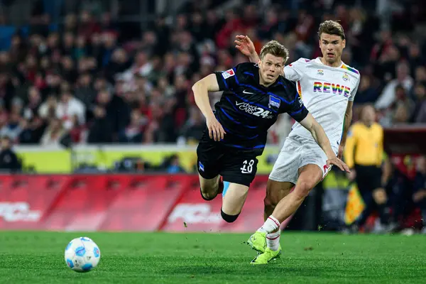 COLOGNE, GERMANY - 5 APRIL, 2025: Luca Schuler, Jooel Schmied - Rhein Energie Stadion 'da 2.Bundesliga 1.FC Koeln' e karşı Hertha BSC maçı