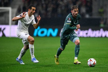 FRANKFURT, GERMANY - 17 APRIL, 2025: Ellyes Skhiri, James Maddison - Eintracht Frankfurt Tottenham Hotspur F.C. Deutsche Bank Park 'ta..