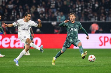 FRANKFURT, GERMANY - 17 APRIL, 2025: Ellyes Skhiri, James Maddison - Eintracht Frankfurt Tottenham Hotspur F.C. Deutsche Bank Park 'ta..