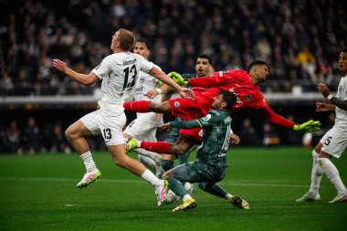 FRANKFURT, GERMANY - 17 APRIL, 2025: Kaua Santos, James Maddison - Eintracht Frankfurt Tottenham Hotspur F.C. Deutsche Bank Park 'ta..