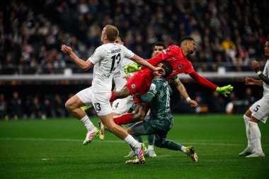 FRANKFURT, GERMANY - 17 APRIL, 2025: Kaua Santos, James Maddison - Eintracht Frankfurt Tottenham Hotspur F.C. Deutsche Bank Park 'ta..