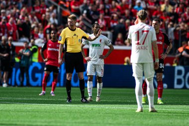 LEVERKUSEN, GERMANY - 26 APRIL, 2025: Dingert, Christian - Bundesliga maçı Bayer 04 Leverkusen FC Augsburg 'a karşı Bayarena' da.