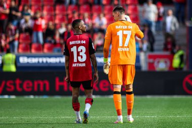 LEVERKUSEN, GERMANY - 26 APRIL, 2025: Arthur, Matej Kovar - Bayer 04 Leverkusen-FC Augsburg maçında.