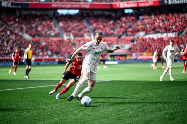 LEVERKUSEN, GERMANY - 26 APRIL, 2025: Marius Wolf - Bundesliga maçı Bayer 04 Leverkusen, Bayarena 'da FC Augsburg' a karşı.
