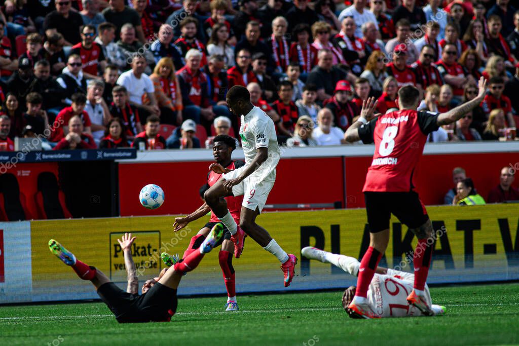LEVERKUSEN, GERMANY - 26 APRIL, 2025: Samuel Essende - The Bundesliga match Bayer 04 Leverkusen vs FC Augsburg at BayArena.