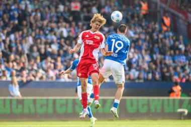 BOCHUM, Almanya - 27 Nisan 2025: Matus Bero, Tom Rothe - Bundesliga maçı VfL Bochum - 1. FC Union Berlin 1: 1 Vonovia Stadyumu 'nda.