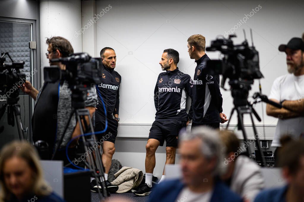 LEVERKUSEN, GERMANY - 9 MAY, 2025:  - Sebastian Parrilla, Ismael Camenforte Lopez, Alberto Encinas. The Bundesliga match Bayer 04 Leverkusen vs Borusssia Dortmund at BayArena.
