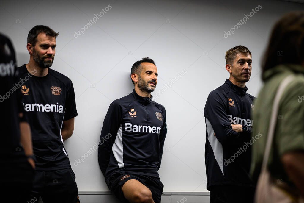 LEVERKUSEN, GERMANY - 9 MAY, 2025:  Ismael Camenforte Lopez, Alberto Encinas. The Bundesliga match Bayer 04 Leverkusen vs Borusssia Dortmund at BayArena.