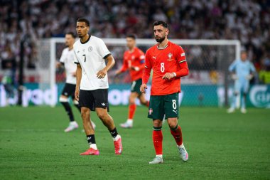 MUNİH, GERMANY - 4 Haziran 2025: Felix Nmecha, Bruno Fernandes - UEFA Uluslar Ligi 2025 Almanya - Allianz Arena 'da Portekiz' e karşı. 